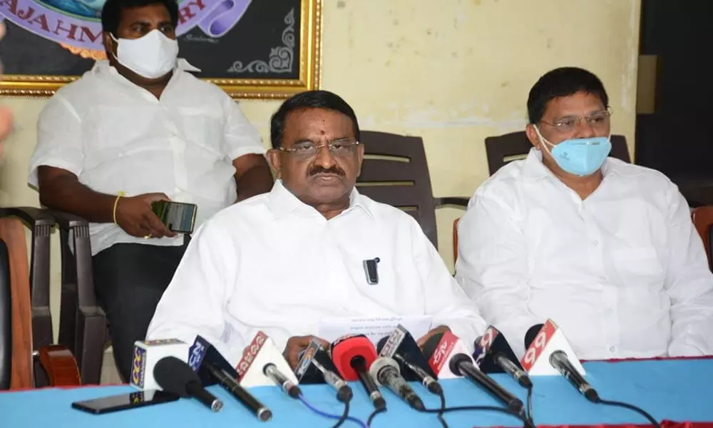 TDP politburo member Pitani Satyanarayana speaking to reporters in Rajamahendravaram on Wednesday
