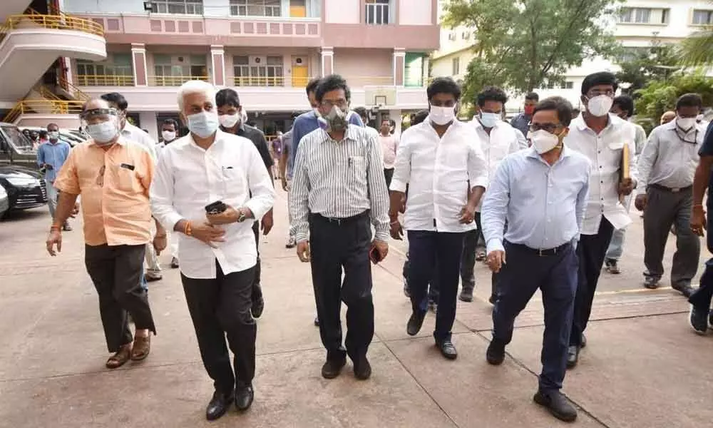 ajya Sabha MP Vijayasai Reddy along with officials supervising the 300-bed facility to come up at Sheela Nagar on Thursday
