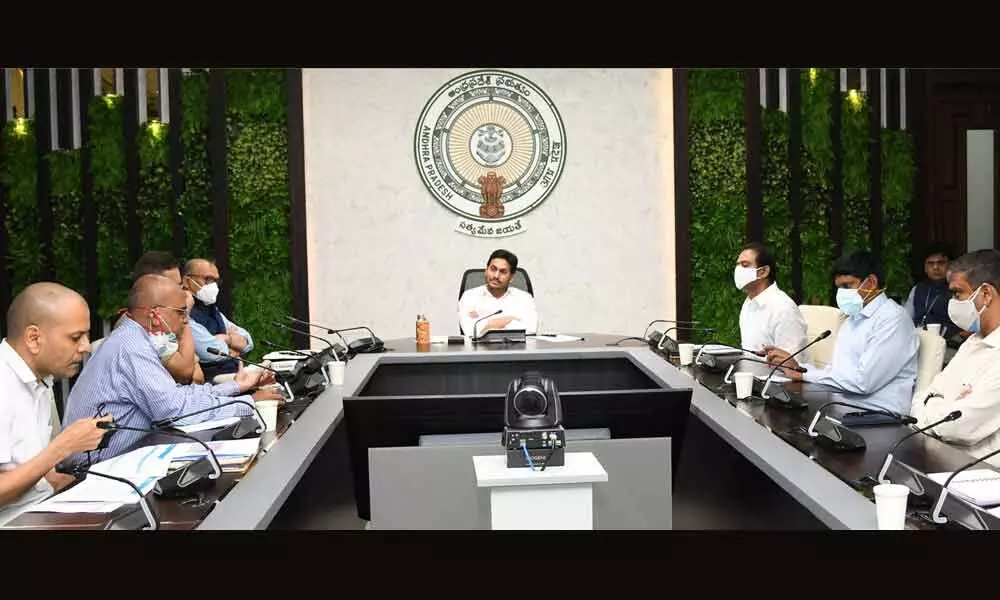 Chief Minister Y S Jagan Mohan Reddy reviewing Covid-19 situation at his camp office on Thursday