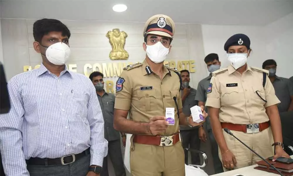 Commissioner of Police Tarun Joshi showing Remdevisir injections being sold in black market in Warangal on Thursday