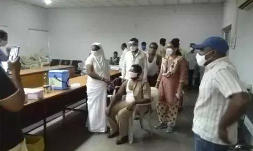 Covid-19 vaccine being administered at NTR Bus Station in Guntur on Thursday