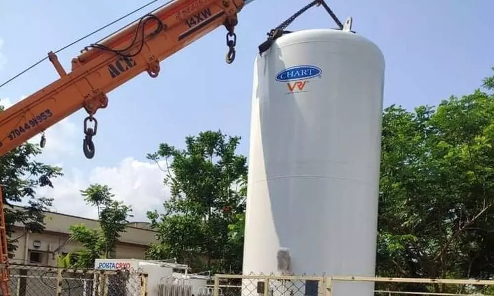 Oxygen tank being installed at MR Hospital in Vizianagaram