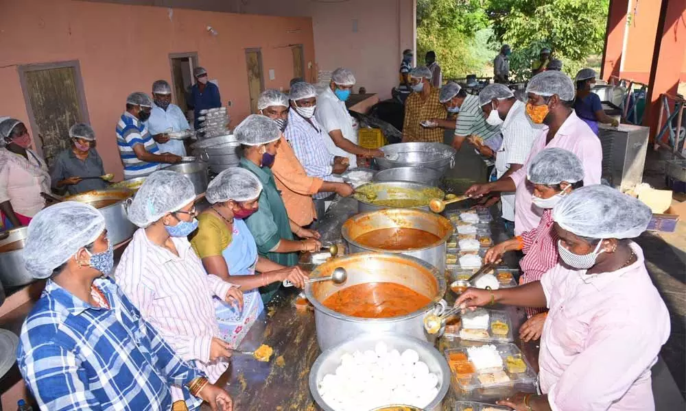 Tourism staff preparing nutritious food to Covid patients at the Shilparamam campus in Anantapur