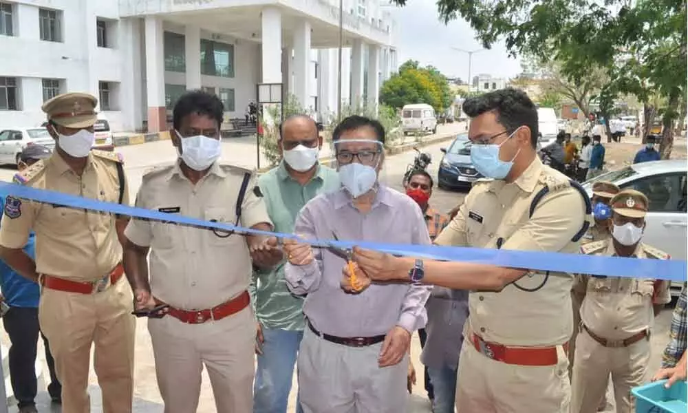 Officer on Special Duty (OSD) Harshavardhan Srivastava inaugurating 24x7 Police Corona Helpline at Government RIMS Hospital in Adilabad