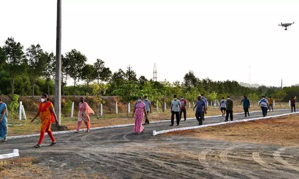 Covid patients going for a walk at Police CCC in Ongole