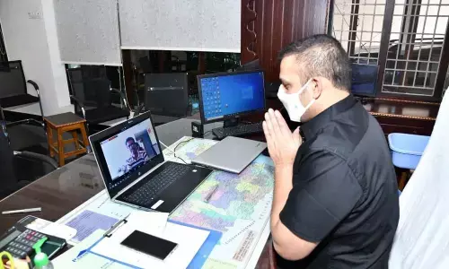 Prakasam SP Siddharth Kaushal thanking P Mallikharjuna from Dubai for donating Rs 50,116 for Police CCC on Friday