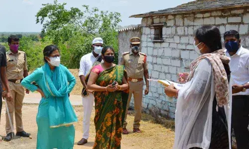 District Collector Pausumi Basu enquiring about the house-to-house survey at Rampur Thanda on Friday