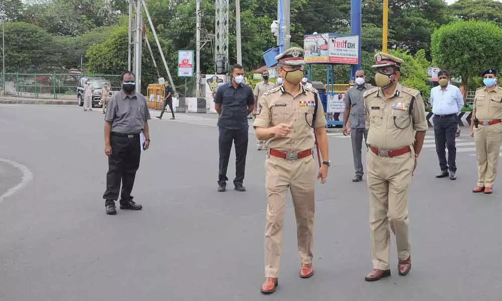 DGP Gautham Sawang, Commissioner of Police B Srinivasulu and other officers  inspecting  the curfew in Vijayawada on Sunday
