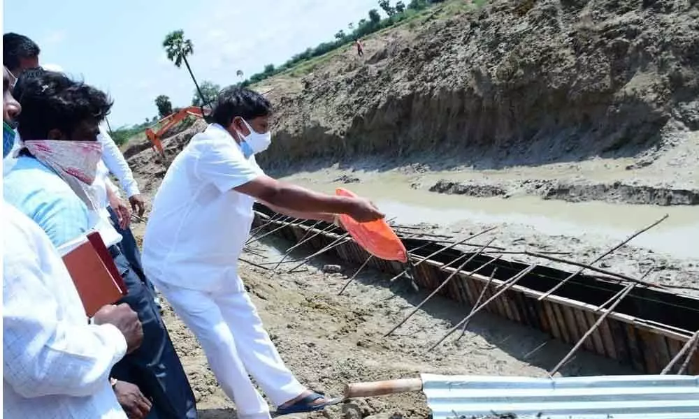 MLA N Bhaskar Rao laying foundation for the construction of check dam on Paleru Vagu at Bommakal village on Sunday