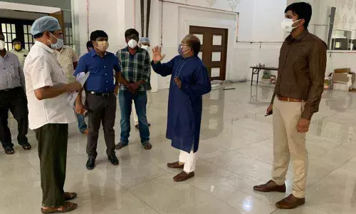 District Collector Md Imtiaz along with other officials inspecting the  arrangements being made for Covid patients at Venue Convention Centre in Vijayawada on Sunday