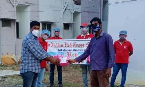 IRCS members distributing medical kits at Covid care centre in Patrunivalasa on Sunday