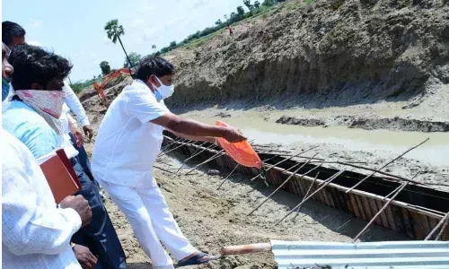MLA N Bhaskar Rao laying foundation for the construction of check dam on Paleru Vagu at Bommakal village on Sunday