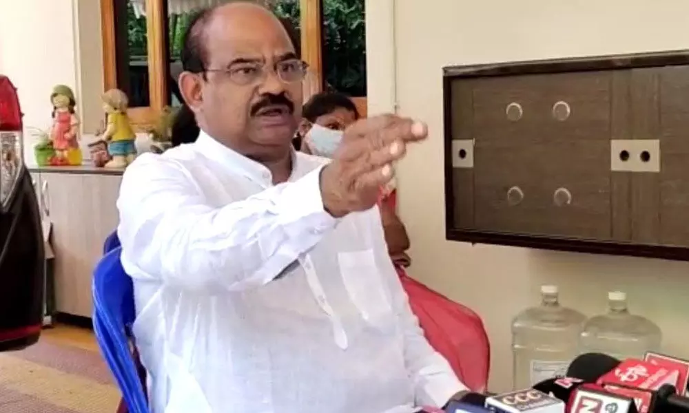 YSRCP urban coordinator Dr Akula Satyanarayana speaking to reporters in Rajamahendravaram on Monday