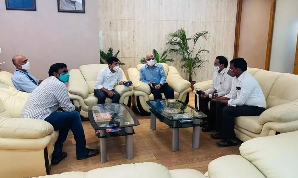 MP Dr M Gurumoorthy reviewing the progress of airport development works with officials in Tirupati on Monday. Airport Director S Suresh and other officials are also seen