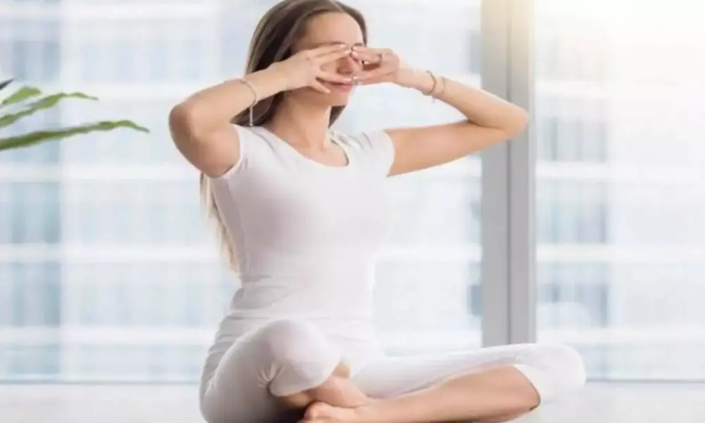 Breathing exercise and yoga will help to fight Covid