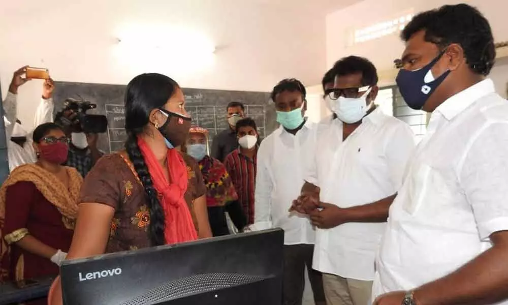 Mayor Kavati Manohar Naidu, MLA Maddali Giridhara Rao inspecting the Vaccination Centres in Guntur city on Wednesday