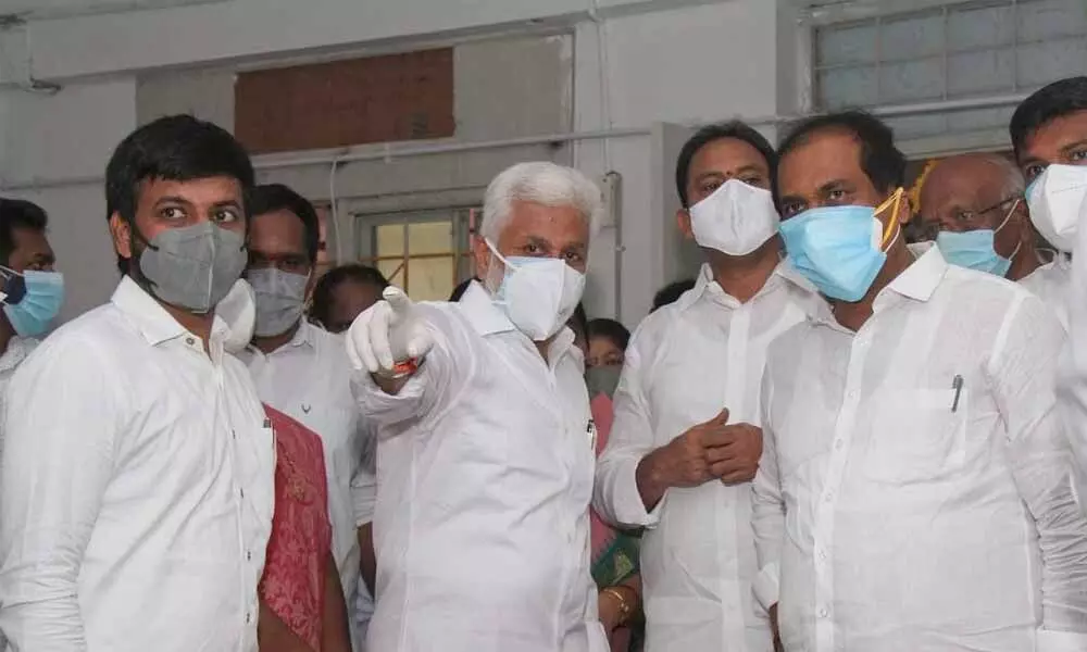 YSRCP Rajya Sabha member V Vijayasai Reddy along with Health Minister Alla Nani
