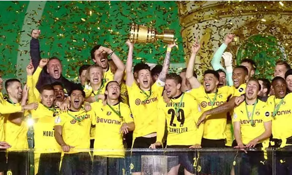 Haaland, Sancho fire Dortmund to fifth German Cup title