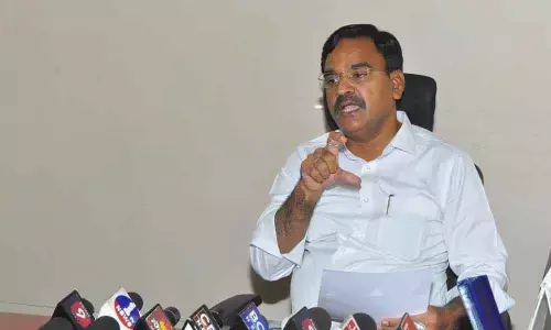 Deputy Chief Minister Amzath Basha addressing press conference at his camp office in Kadapa on Saturday.