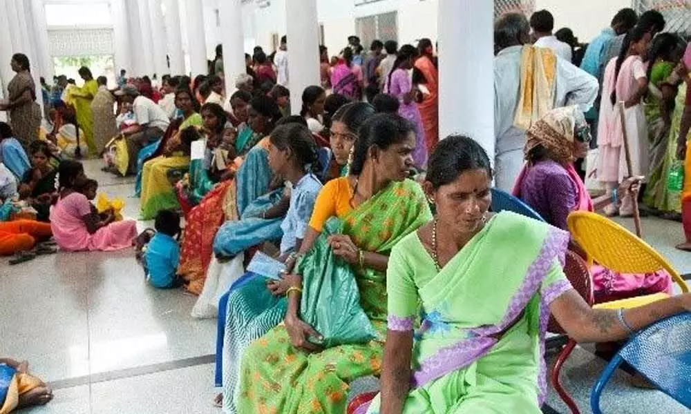 Patients and their relatives waiting in Government hospital for admission in Anantapur