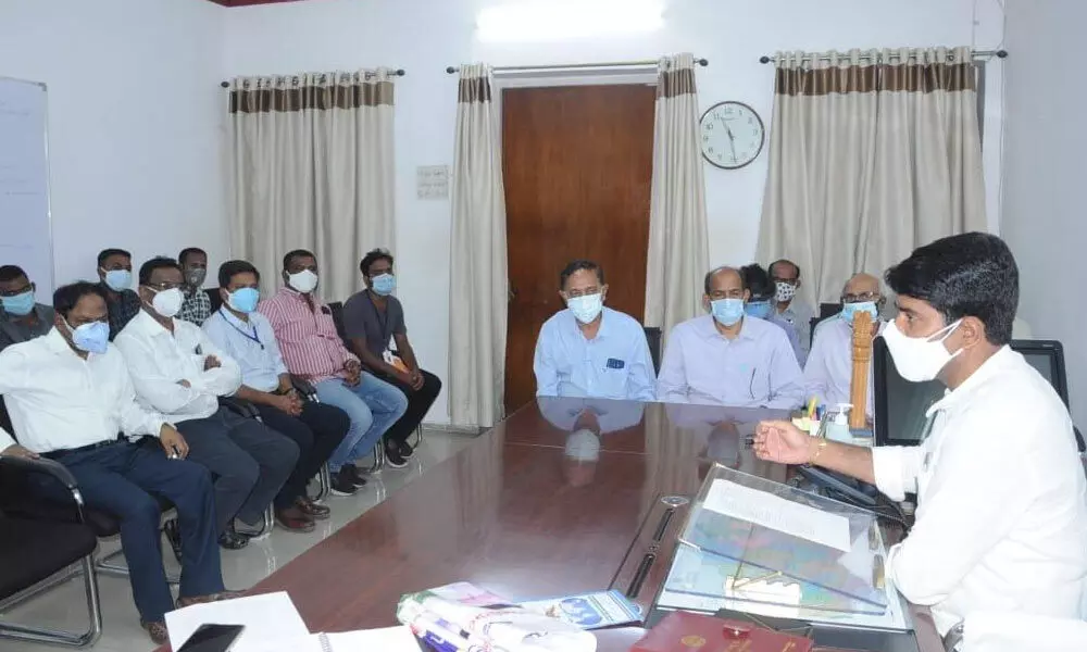 Collector Narayana Reddy addressing IMA representatives and owners of scanning centres during a meeting held at Collectorate office in Nizamabad on Sunday