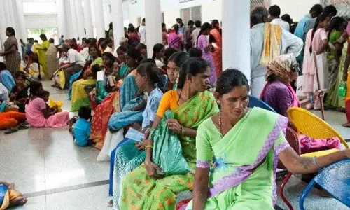 Patients and their relatives waiting in Government hospital for admission in Anantapur