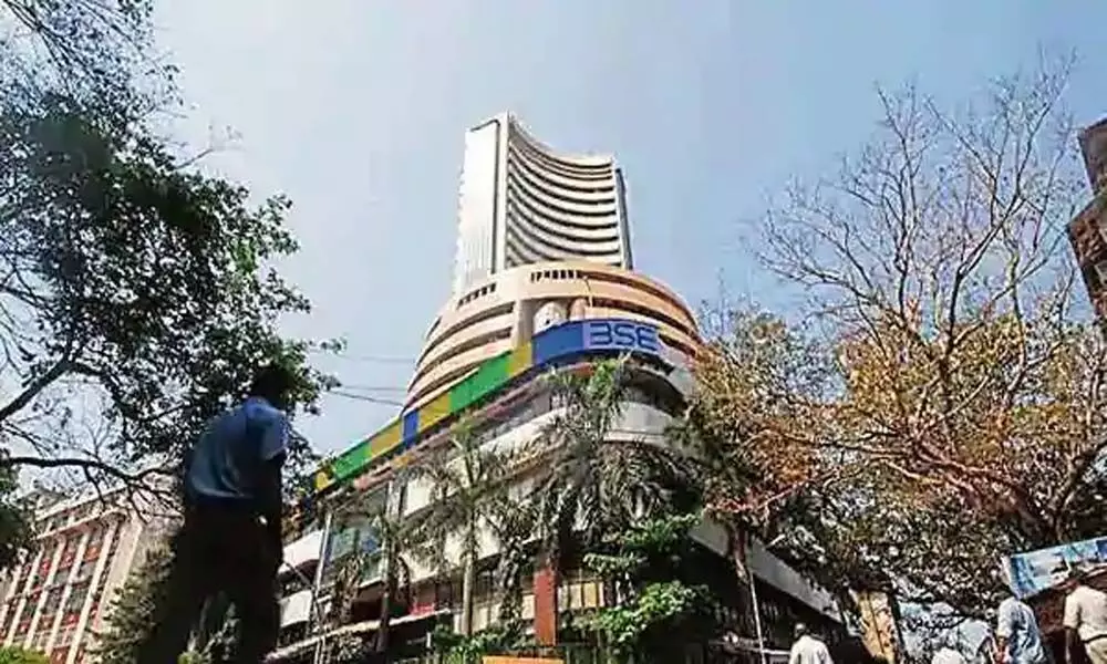 Markets closed with modest losses; Sensex fell 179 points & Nifty settles below 15,700 mark