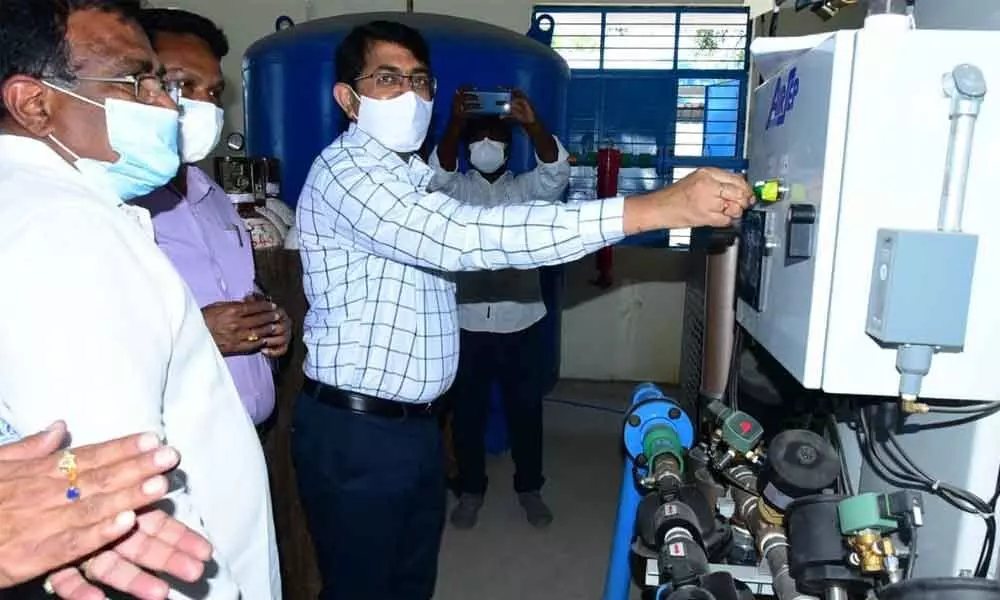 In-charge Collector S Rama Sunder Reddy launching the PSA oxygen plant at Government General Hospital in Kurnool on Monday. Joint Collector Srinivasulu, Hospital Superintendent Dr Narendranath Reddy and others are also seen.