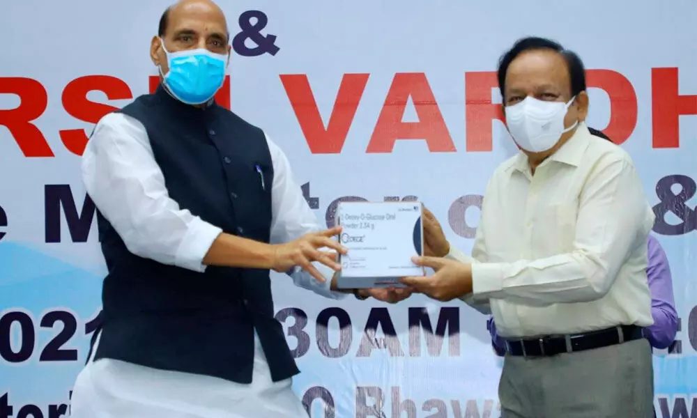 Union Defence Minister Rajnath Singh hands over to Health Minister Harsh Vardhan the newly launched anti-Covid drug 2DG, developed by DRDO, in New Delhi on Monday