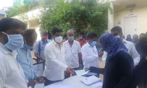 MLA Jaffer Hussain Meraj distributes Kalyana Lakshmi cheques