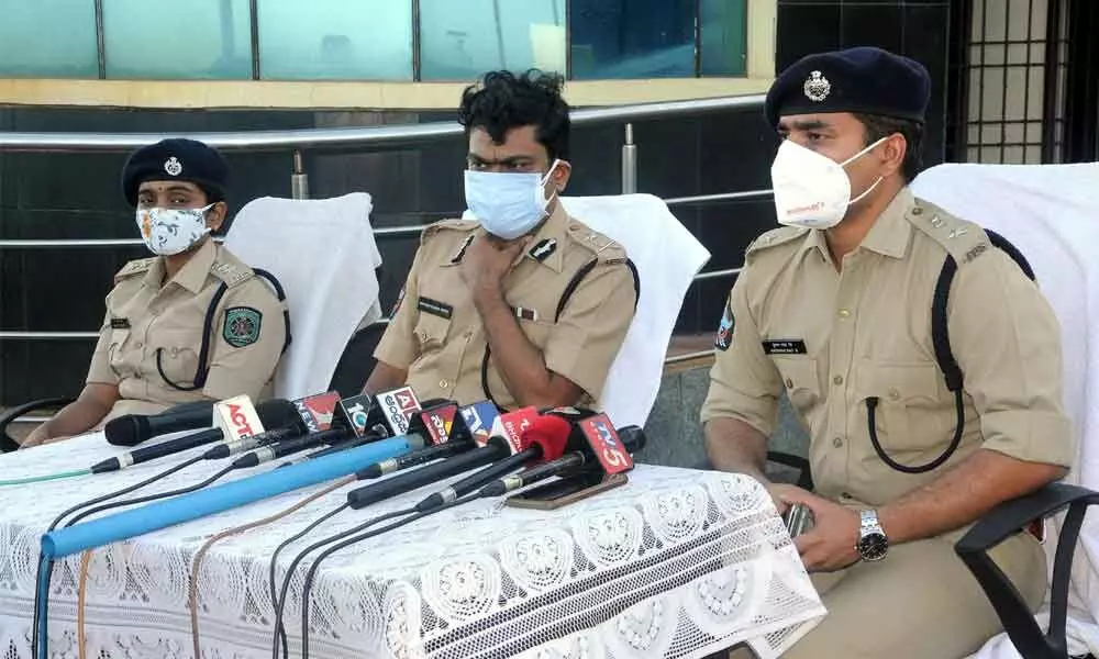 City Police Commissioner Manish Kumar Sinha and district Superintendent of Police B Krishna Rao briefing the media on Wednesday