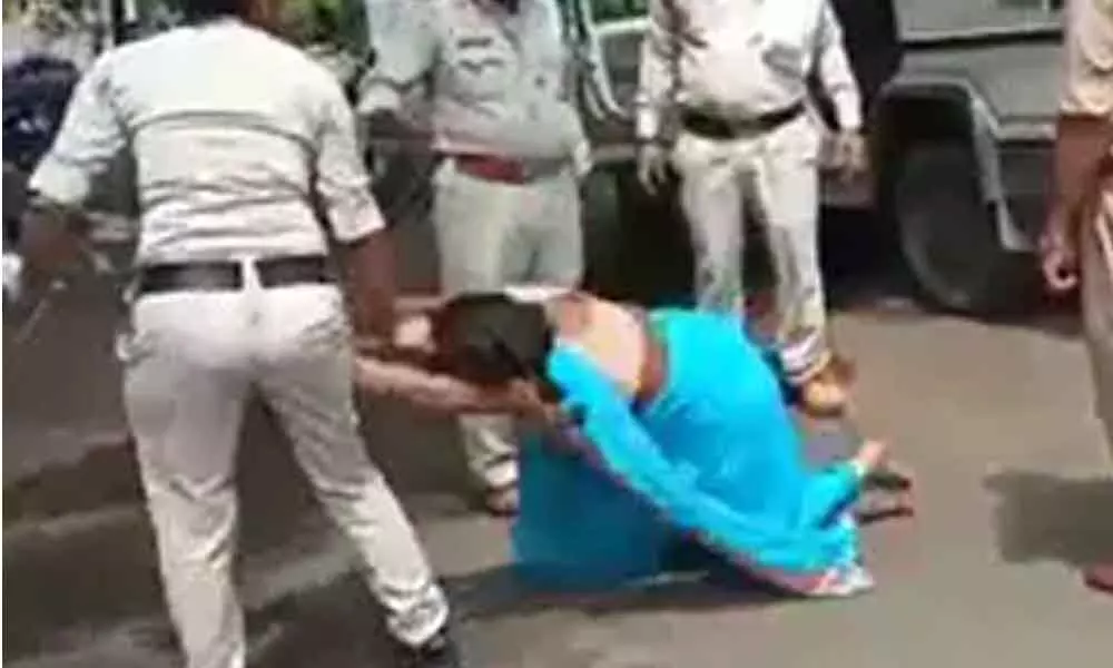 Women Brutally Beaten Up On Road  By The Police Officers