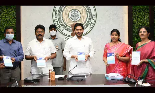 Chief Minister Y S Jagan Mohan Reddy releases  Spoken English book and CDs for Anganwadi children at camp office on Wednesday
