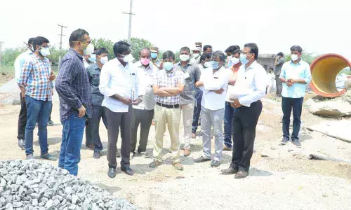 Transport Minister Puvvada Ajay inspecting Gollapadu canal works in Khammam on Wednesday