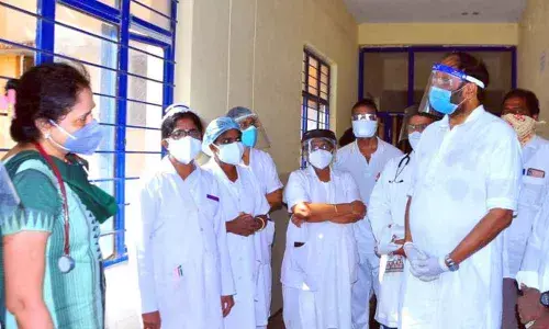 TPCC president and MP Uttam Kumar Reddy inquiring the doctors  about the treatment being provided to corona patients at Government Area Hospital in Huzurnagar on Friday