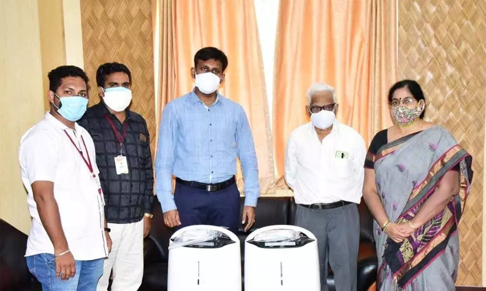 Arthi Home representatives donating oxygen concentrators to Collector CH Harikiran in Kadapa