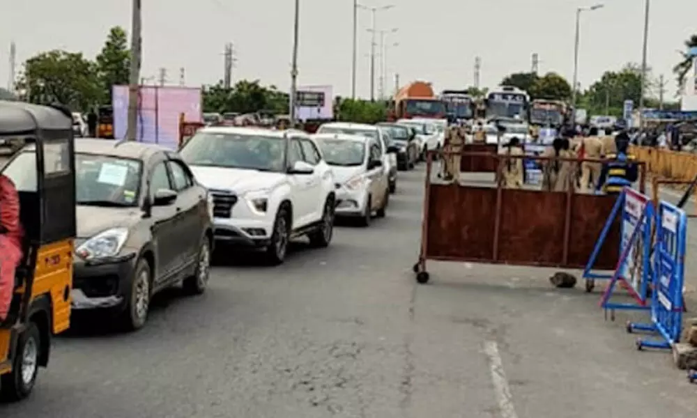 Vehicles lined up at check posts, toll plazas in Telangana