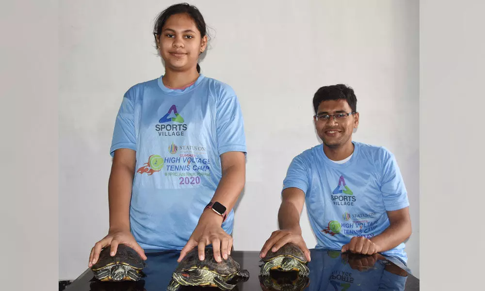 Pet parents to 3 American red-eared turtles celebrate World Turtle Day