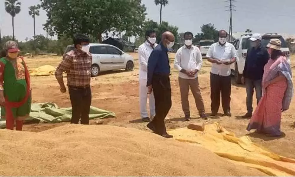 State Civil Supplies Commissioner Anil Kumar at a paddy procurement centre in Bhongir on Sunday. District Collector Anita Ramachandran also seen