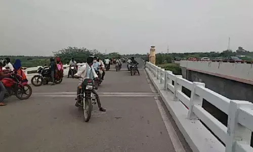 Bike riders from Andhra Pradesh being sent back by Telangana police at Vadapalli in Nalgonda district on Sunday