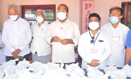 CPM district leaders launching food distribution at Covid patients’ doorstep in Khammam