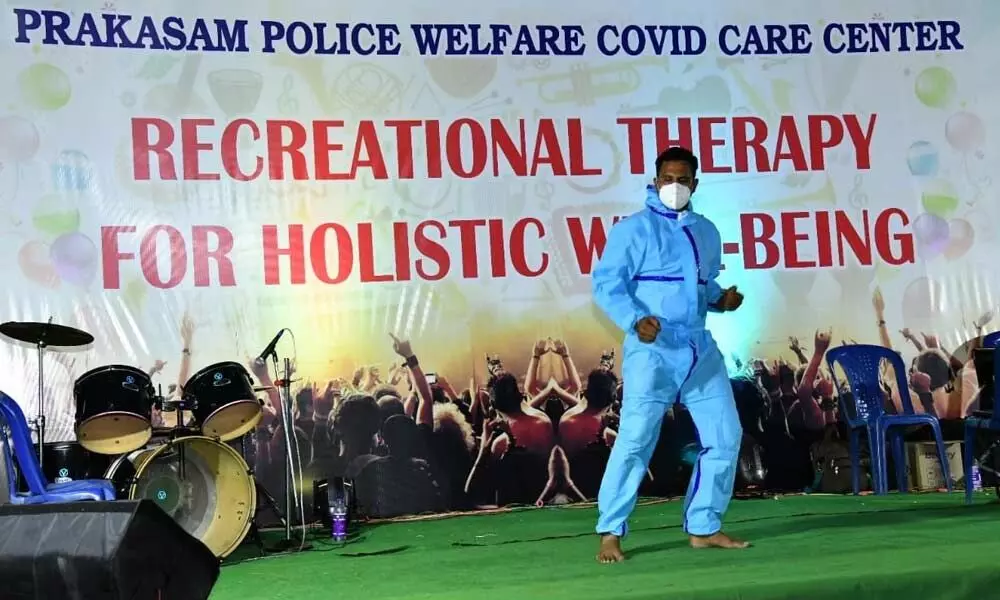 A Covid victim dancing to the tunes at an event organised at Police CCC in Ongole on Sunday evening