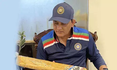 Azharuddin reunited with historic bat