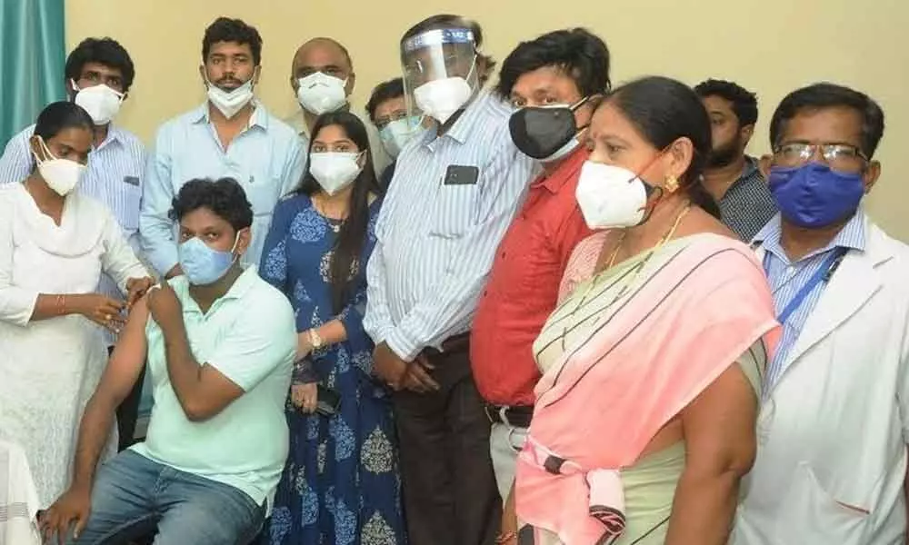 AU staff getting vaccinated in Visakhapatnam on Tuesday