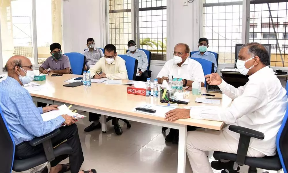 Finance Minister T Harish Rao along with Chief Secretary Somesh Kumar discussing on taking up a vaccination drive for super spreaders at BRKR Bhavan in Hyderabad on Tuesday