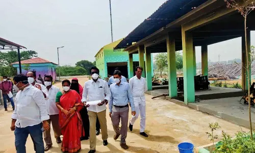 Transport Minister P Ajay Kumar inspecting Vaikunta Dhammam in Ballepally village on Tuesday