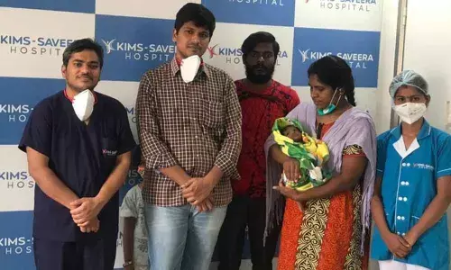 KIMS Savera Dr P V Raghavaiah with the family members of the baby in Anantapur