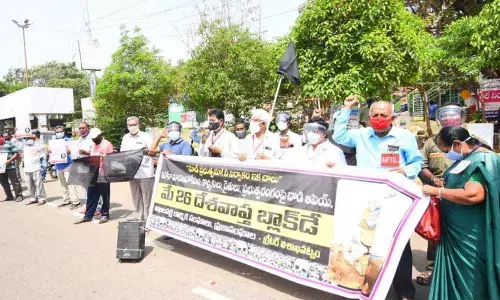CITU activists led by their State president Ch Narasing Rao staging a  protest marking Black Day in Visakhapatnam on Wednesday
