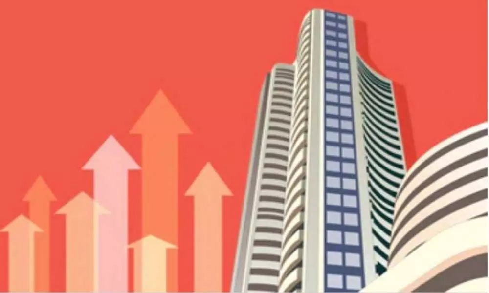 Sensex gains 98 points; Nifty settles at 15,338