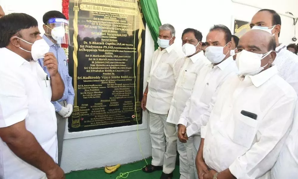 Panchayat Raj Minister  P Ramachandra Reddy inaugurating Revenue Employees’ Function Hall in Chittoor on Friday. Deputy Chief Minister  K Narayanaswamy is also seen.